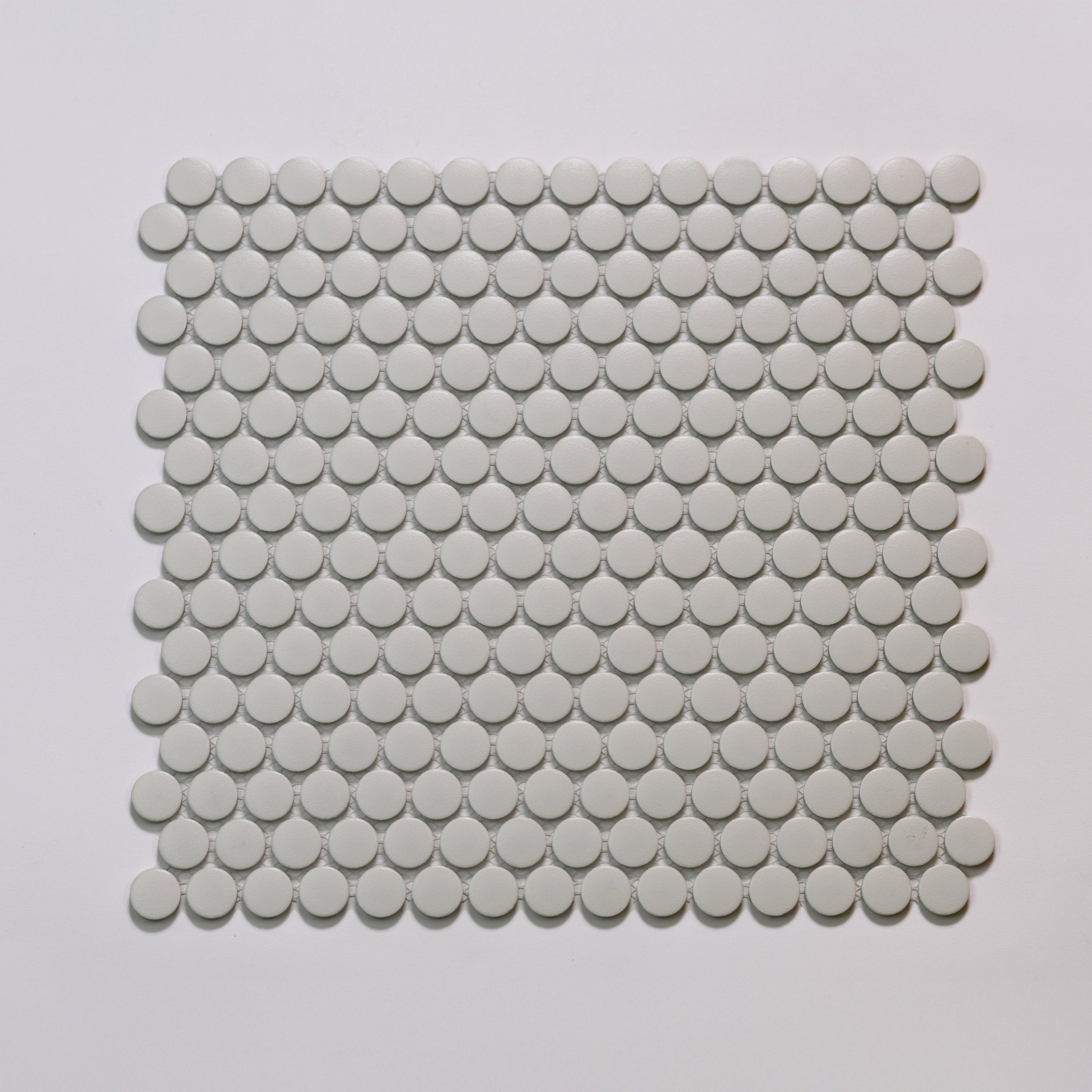 Bedrosians Marin 3/4" Penny Round Matte Porcelain Mosaic in Pebble Gray | Item Code 100004037
