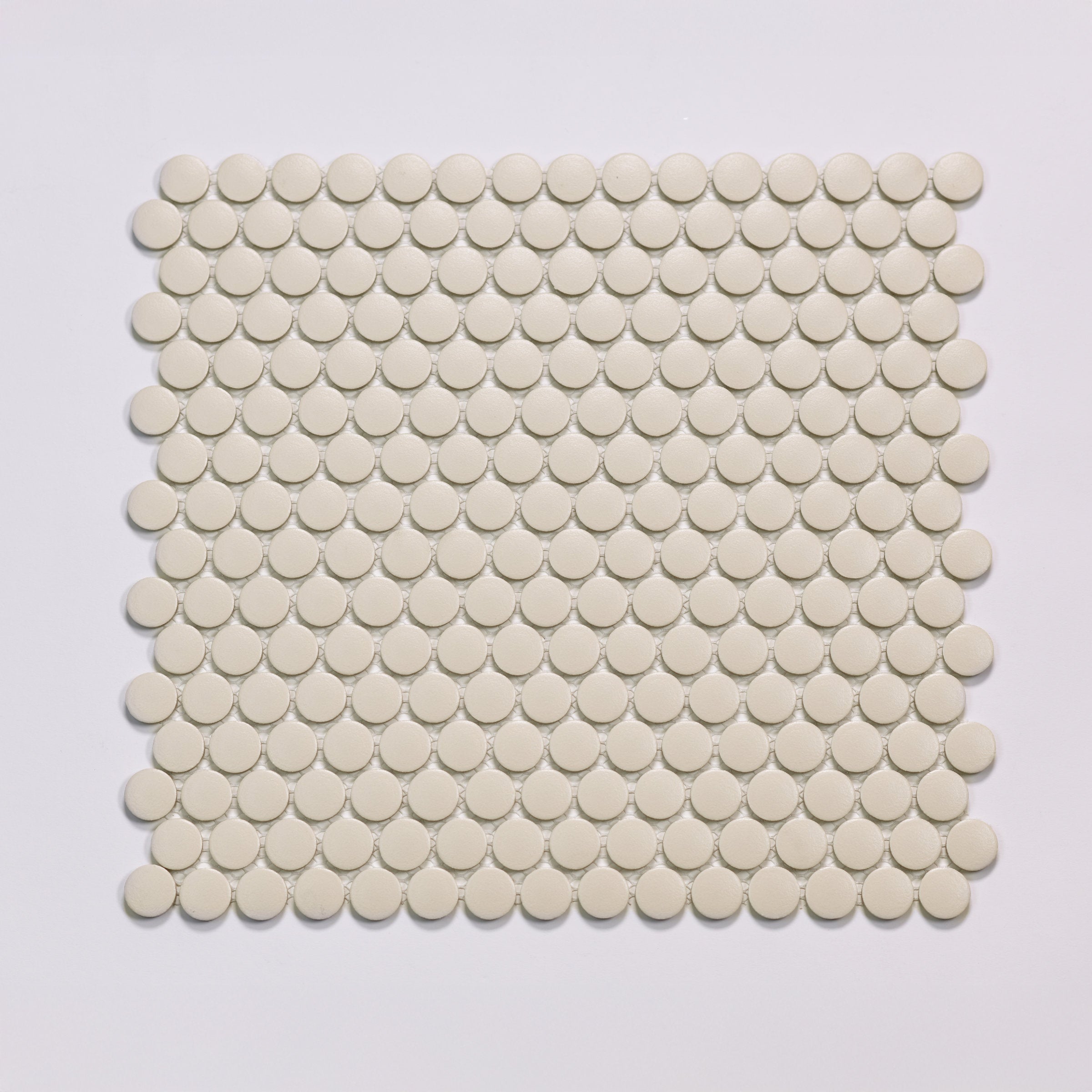 Bedrosians Marin 3/4" Penny Round Matte Porcelain Mosaic in Sand Dollar | Item Code 100004038