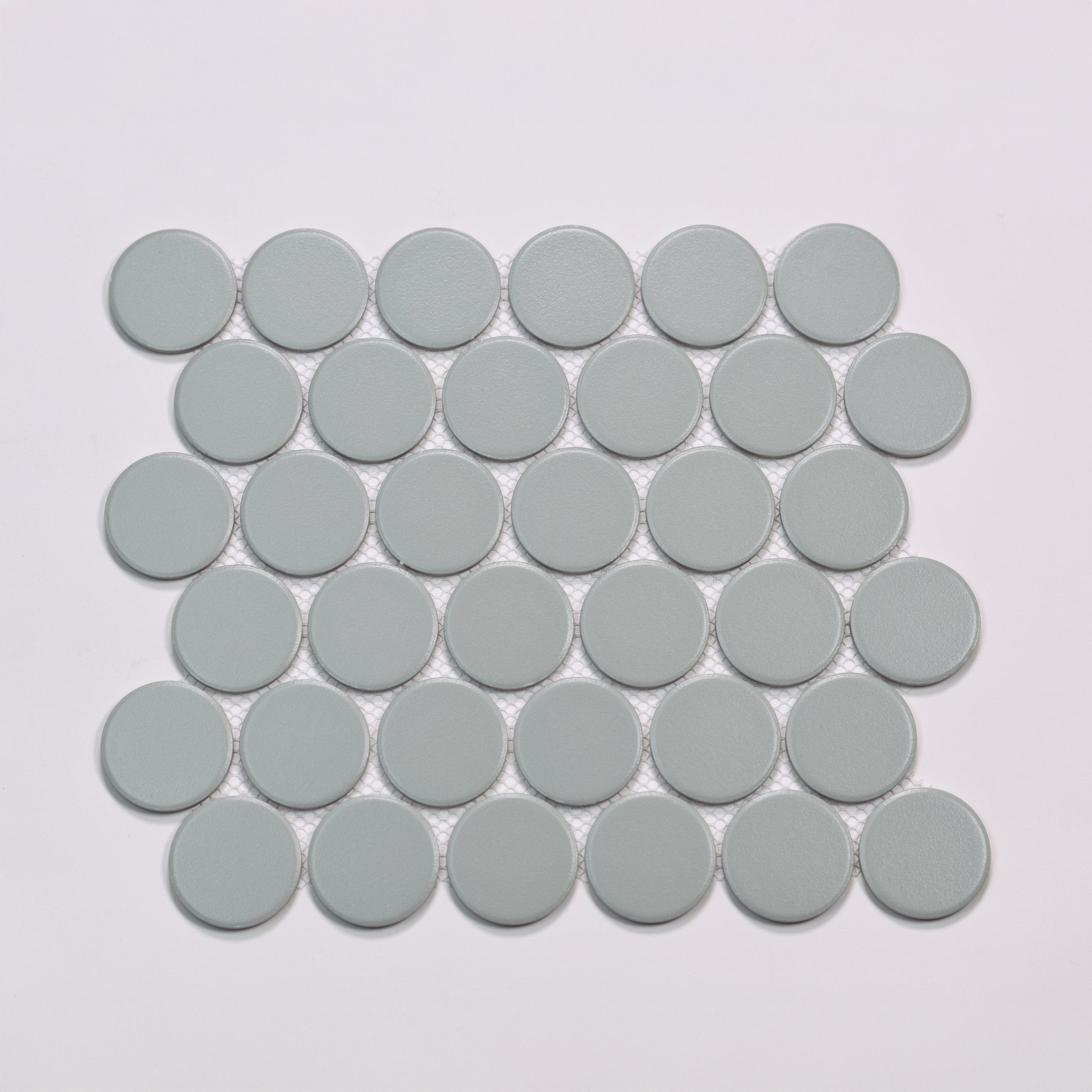 Bedrosians Marin 2" Penny Round Matte Porcelain Mosaic in Aloe Green | Item Code 100004790