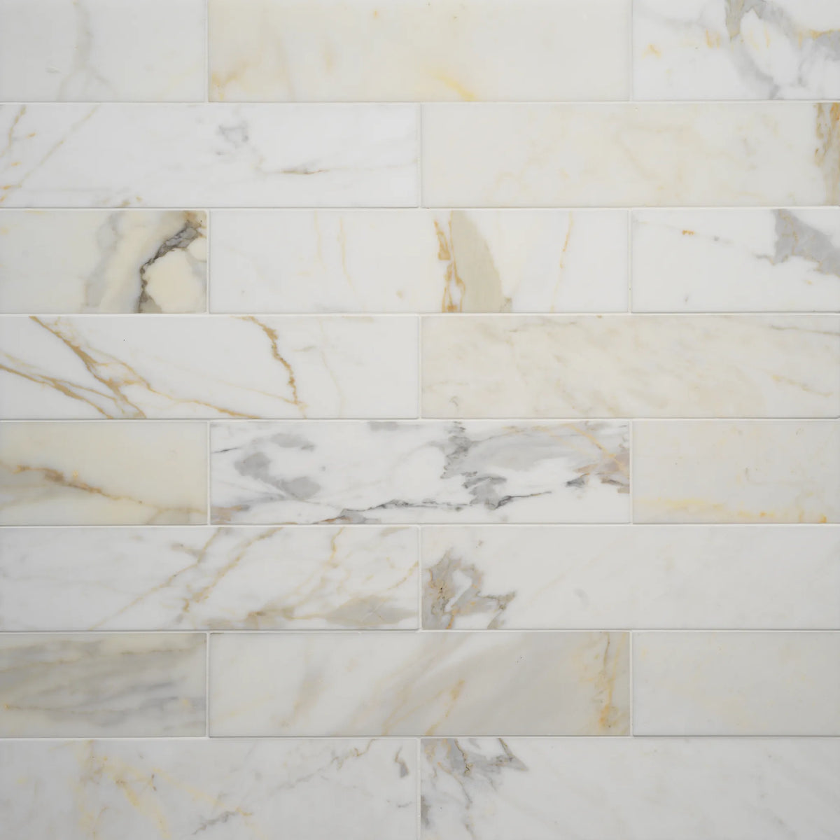 Calacatta 3" x 12" Honed Marble Tile in White